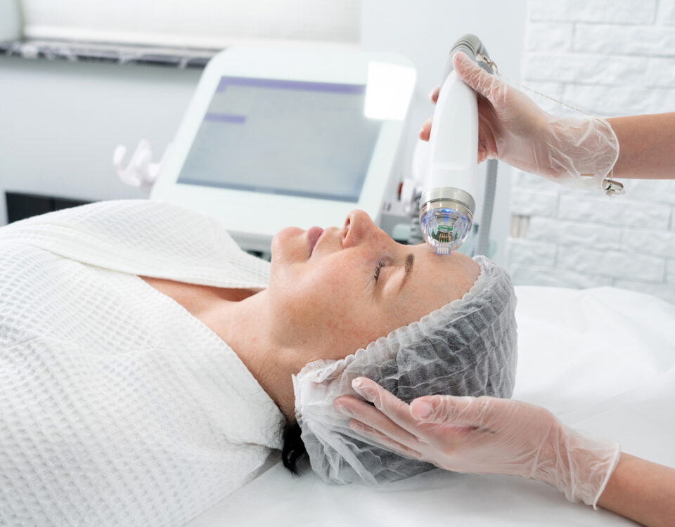 Mature Woman Receiving Laser Treatment In Cosmetology Clinic